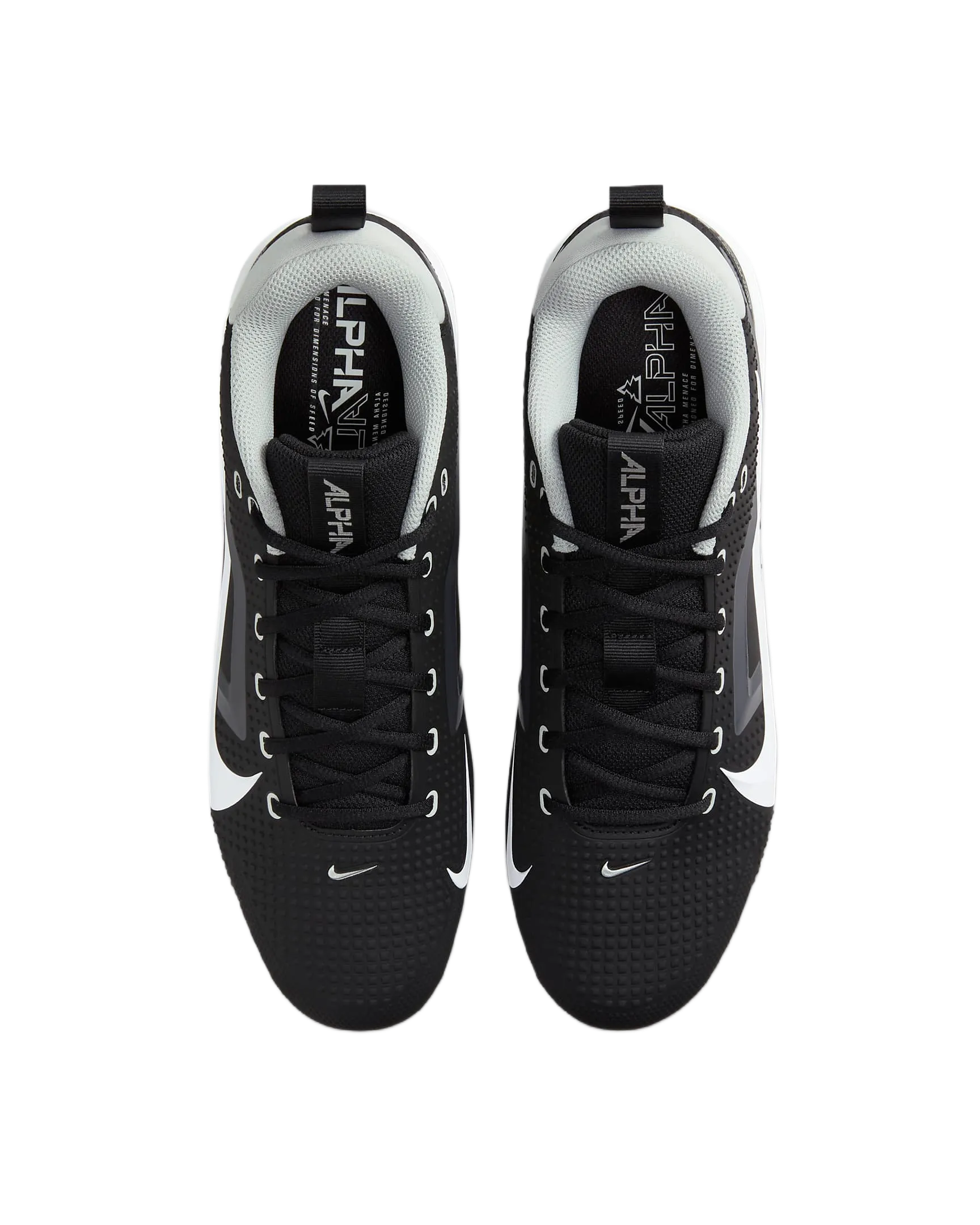 Top view of black and white Nike Alpha Menace Varsity 4 athletic shoes with laces and cushioned ankle support.