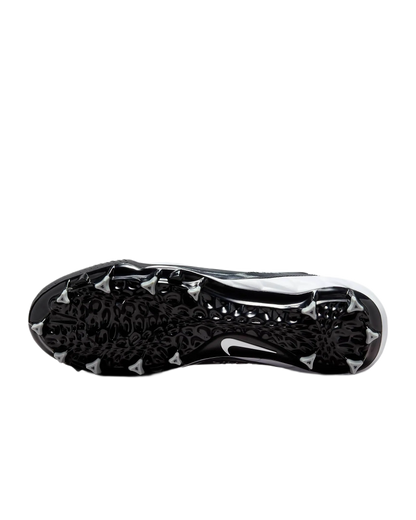 Nike Alpha Menace Varsity 4 football cleat with black studded outsole and white midsole designed for natural movement and cushioning.