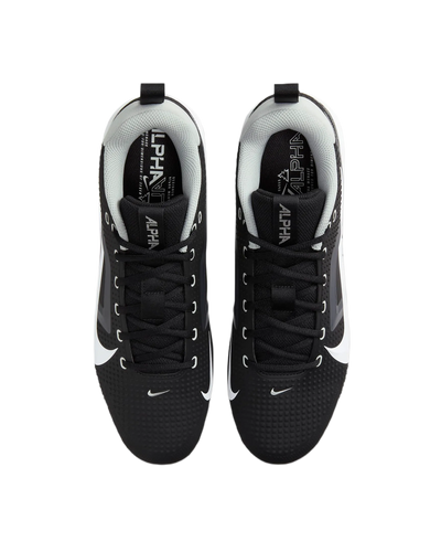 Top view of black and white Nike Alpha Menace Varsity 4 athletic shoes with laces and cushioned ankle support.