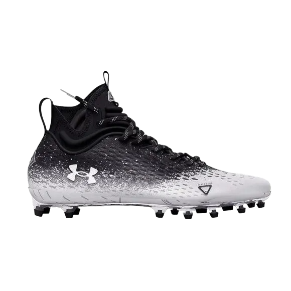 Under Armour UA Spotlight LUX MC 2.0 football cleat in black and white with lightweight breathable upper and multidirectional traction studs.