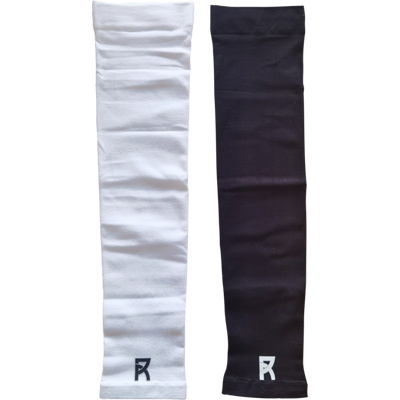 Pair of Reyrr Compression Arm Sleeves in white and black, breathable and elastic for UV protection and sweat wicking
